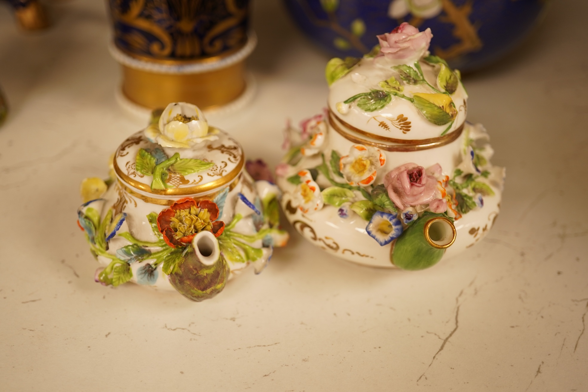A Chinese cloisonné enamel horse and vase, two miniature Rockingham floral teapots, a malachite box etc (9). Cloisonné horse 20cm long.